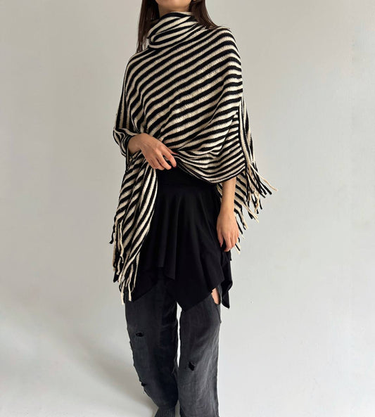 Striped poncho with tassels