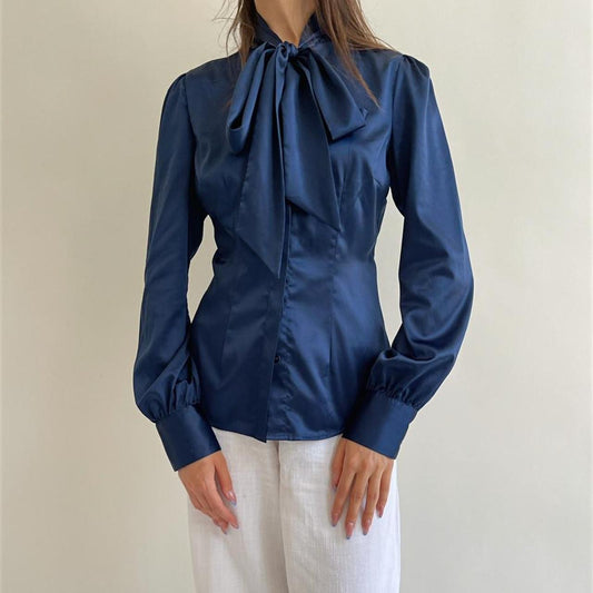 Vintage satin blue blouse with a bow