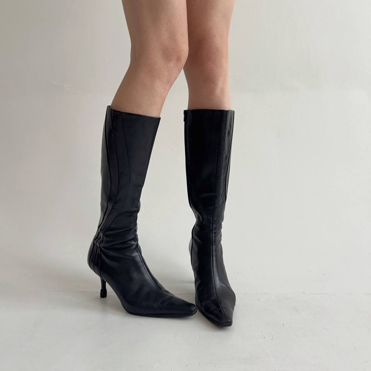 Vintage black faux leather knee high pointy boots