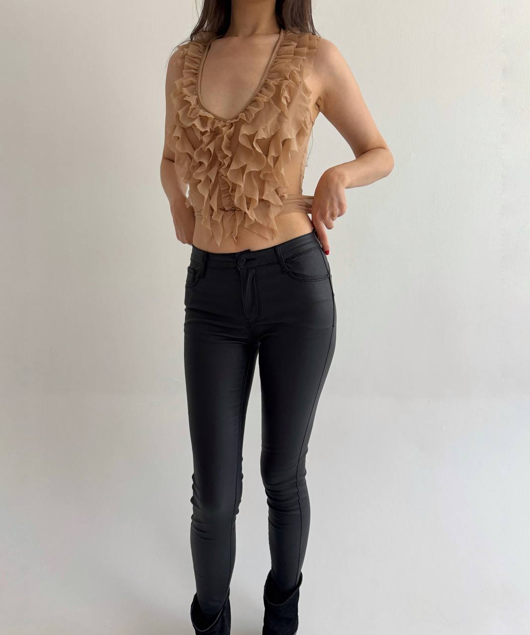 Black wax skinny jeans