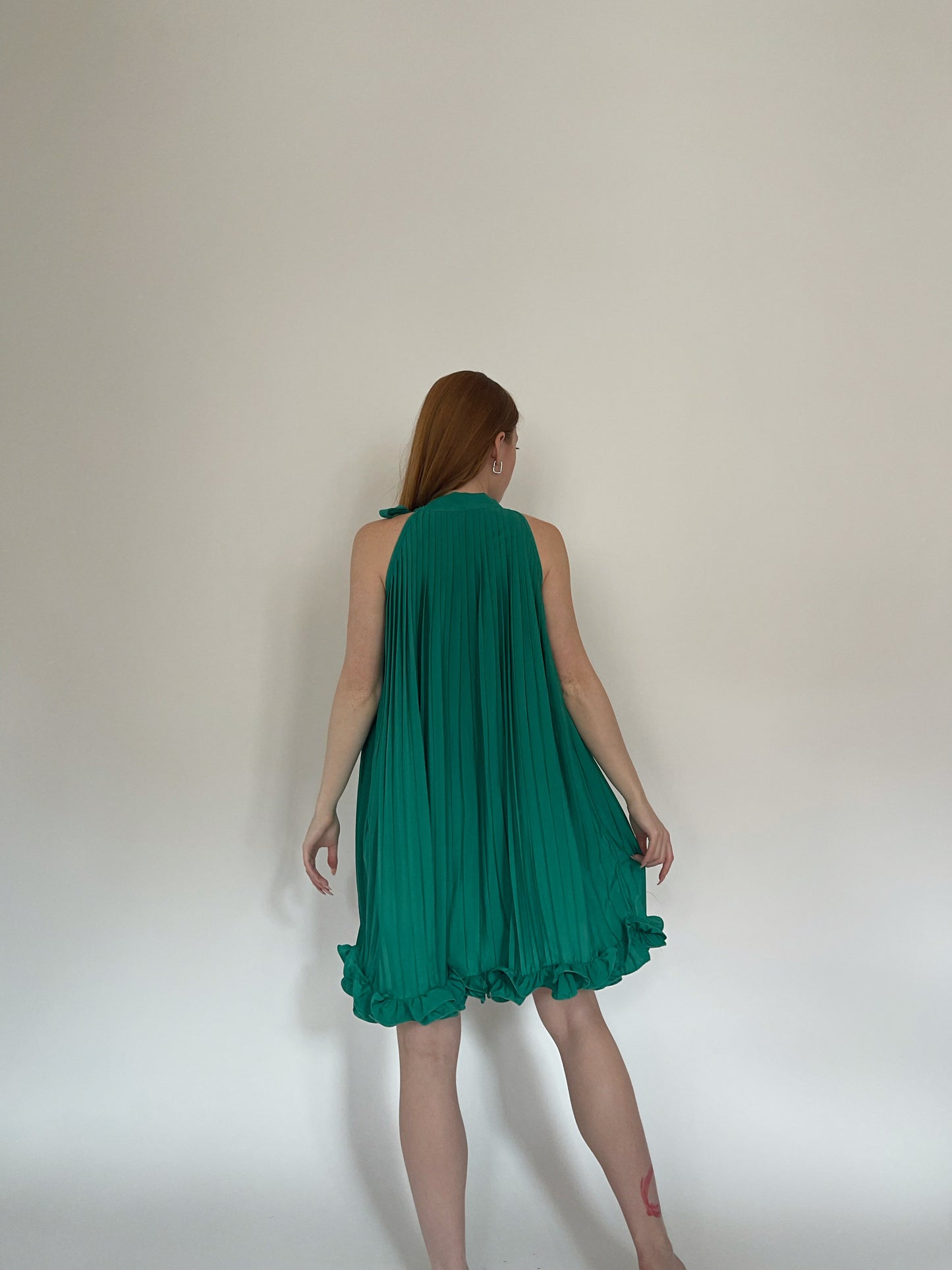 Vintage pleated mini dress with ruched ruffled hem