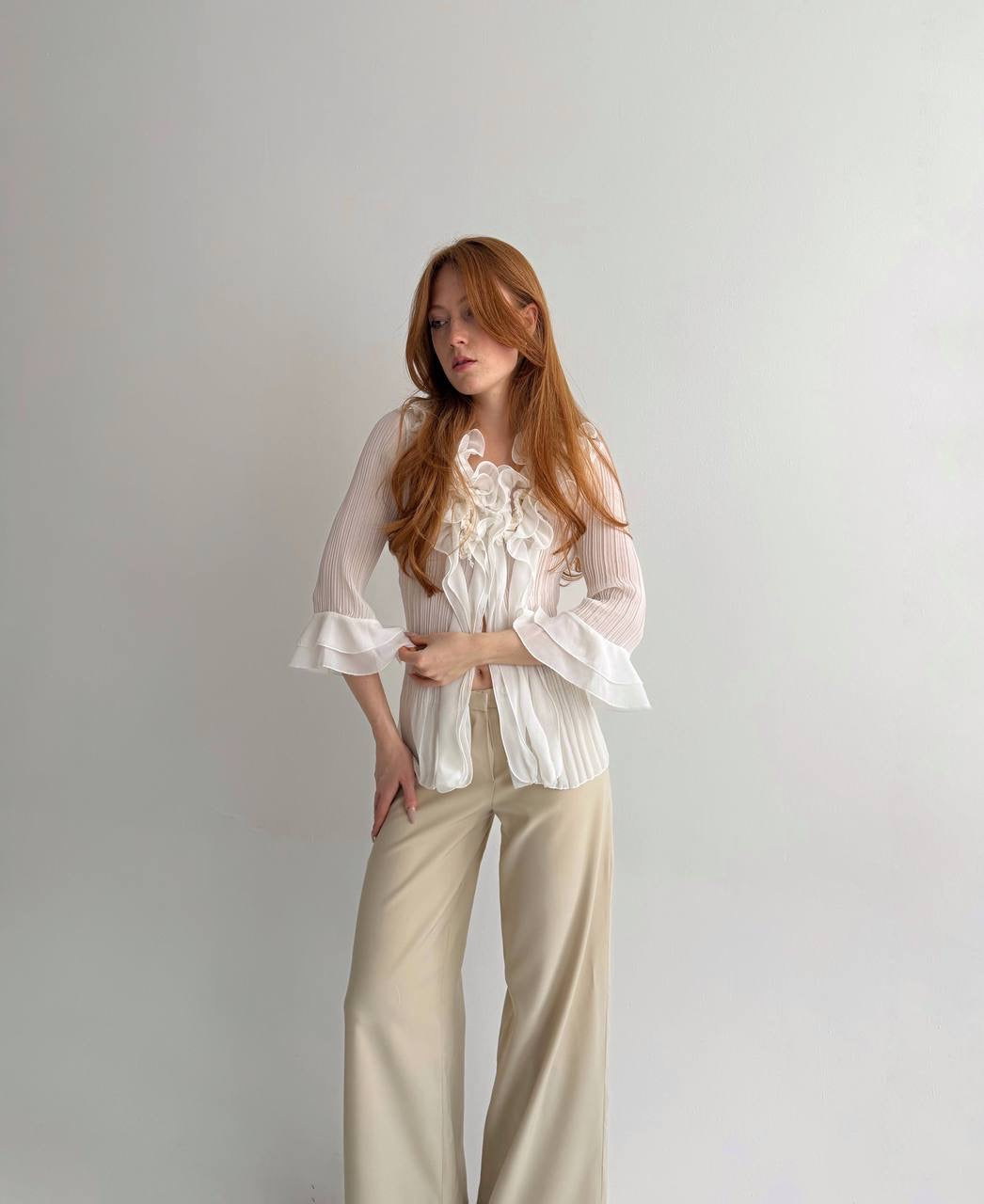 Vintage white pleated blouse with ruffles