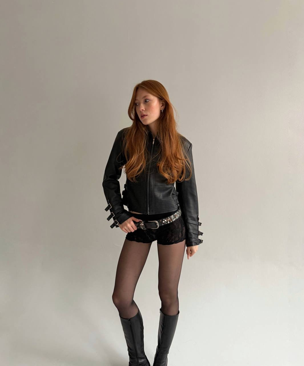 Vintage black faux leather jacket with belts