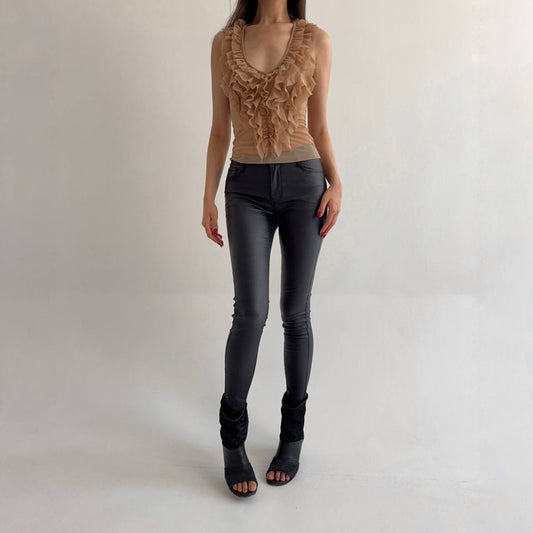 Black wax skinny jeans