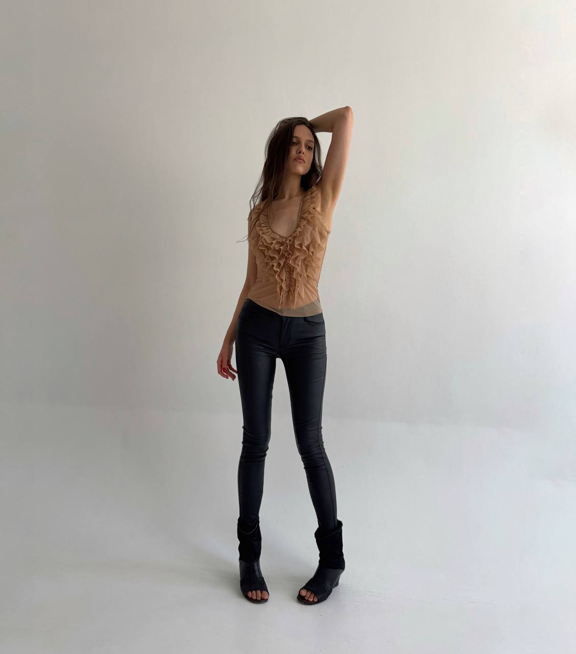 Black wax skinny jeans