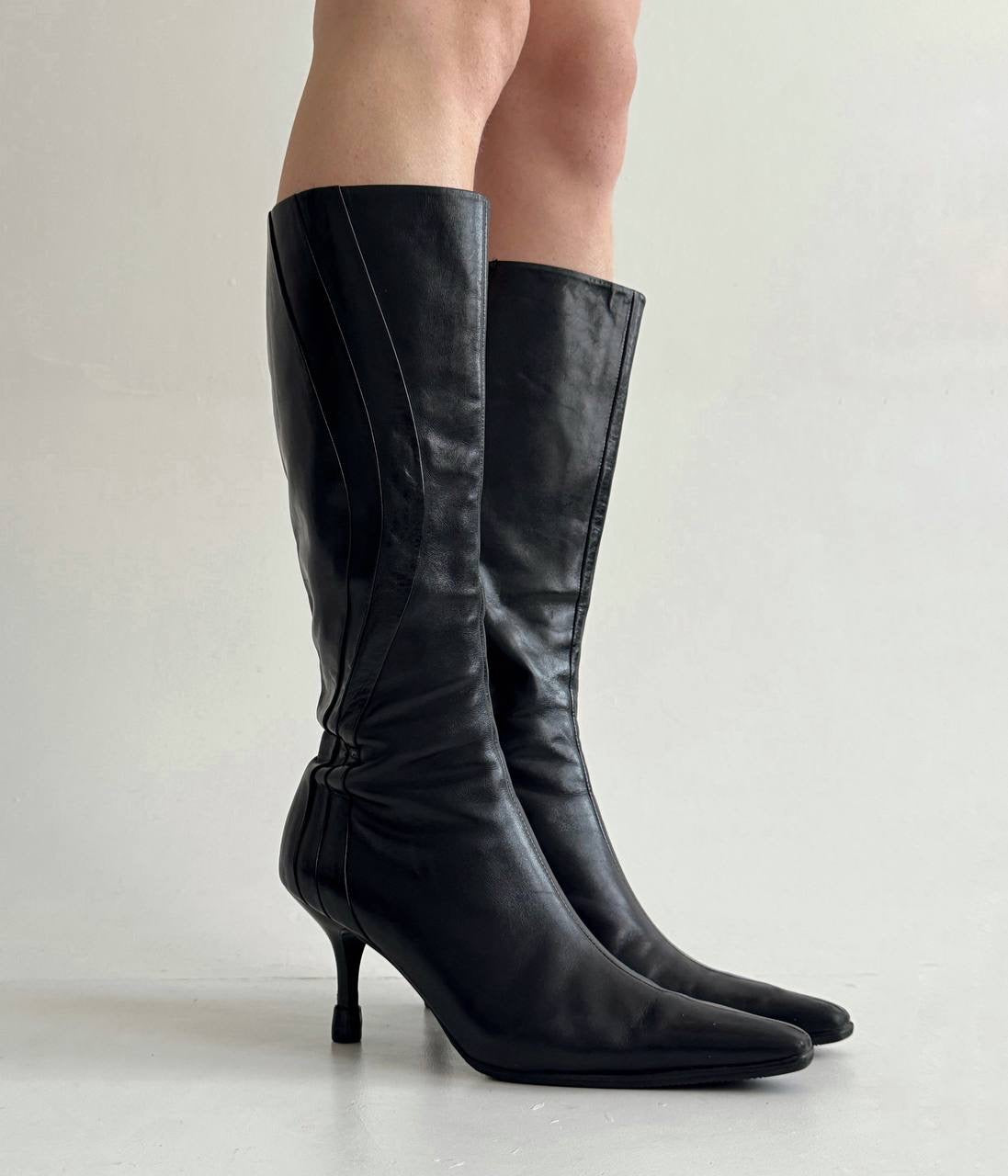 Vintage black faux leather knee high pointy boots