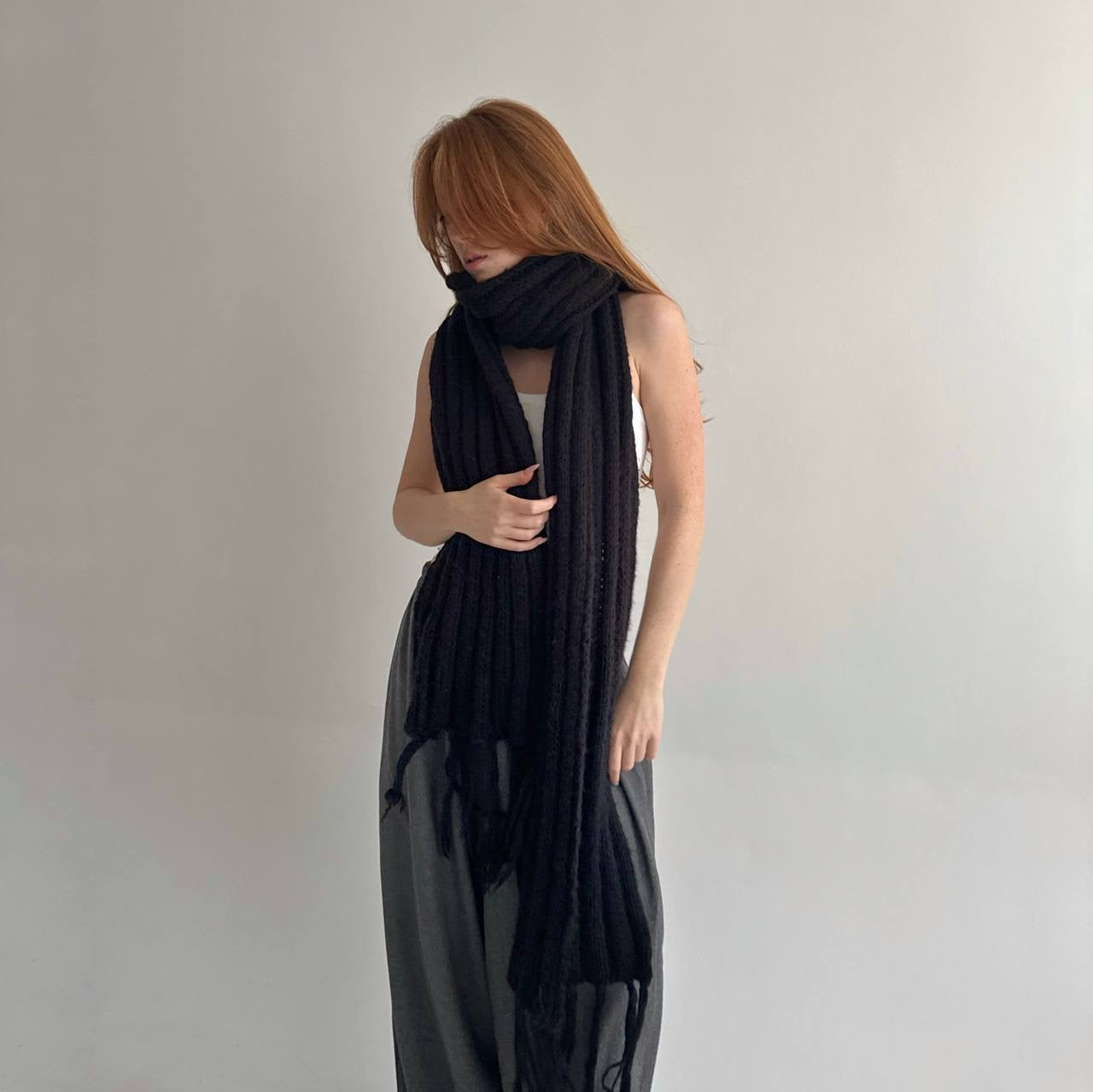 Vintage black knitted warm scarf with tassels