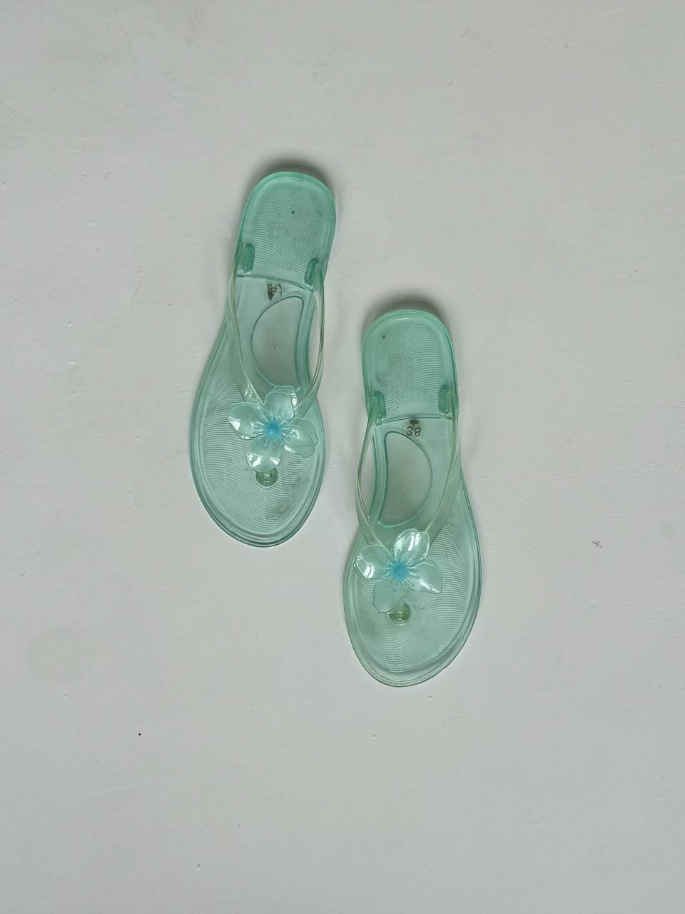 Vintage blue jelly flip flops