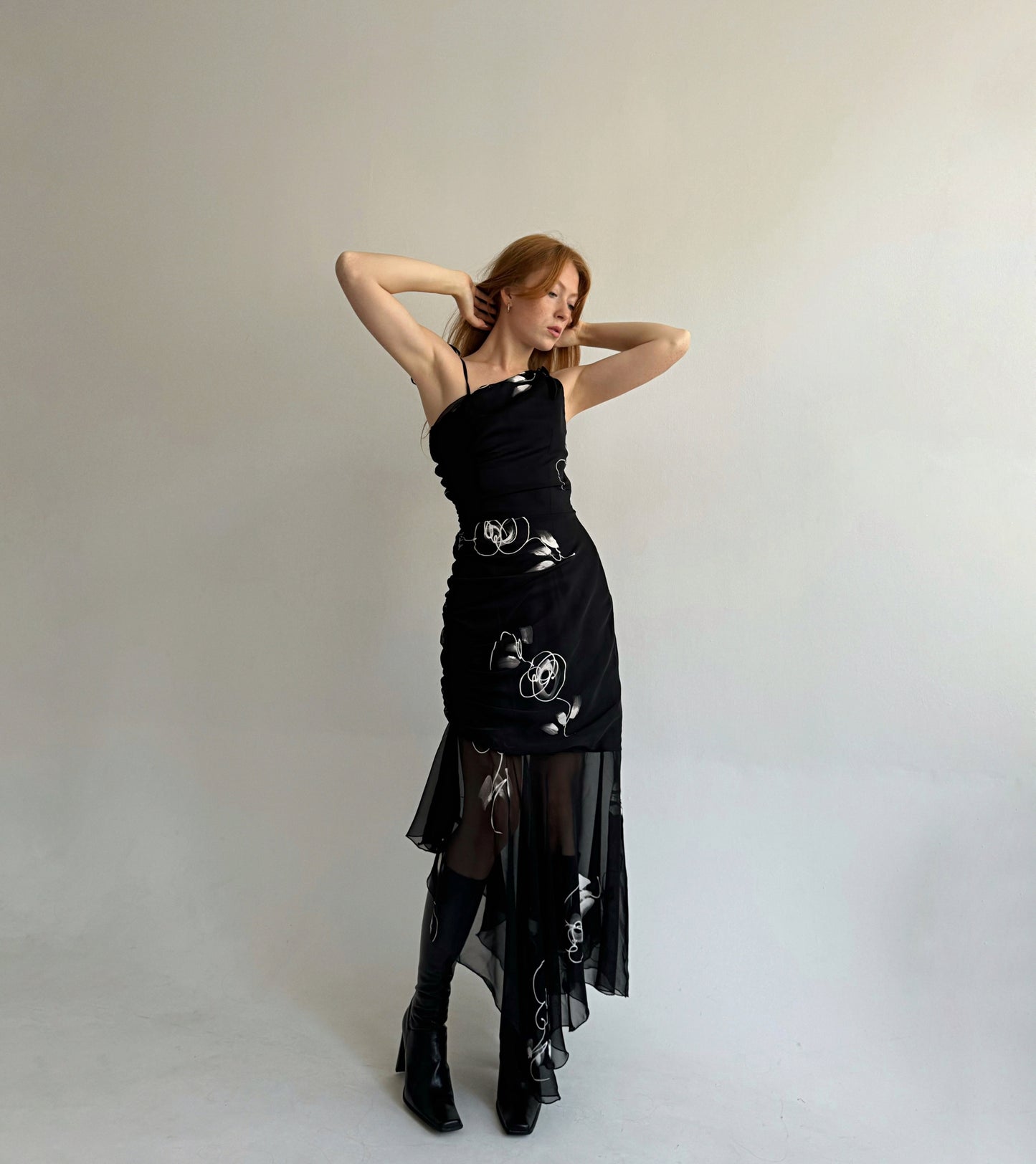 Vintage black asymmetrical maxi dress with a print, gathering and mesh bottom