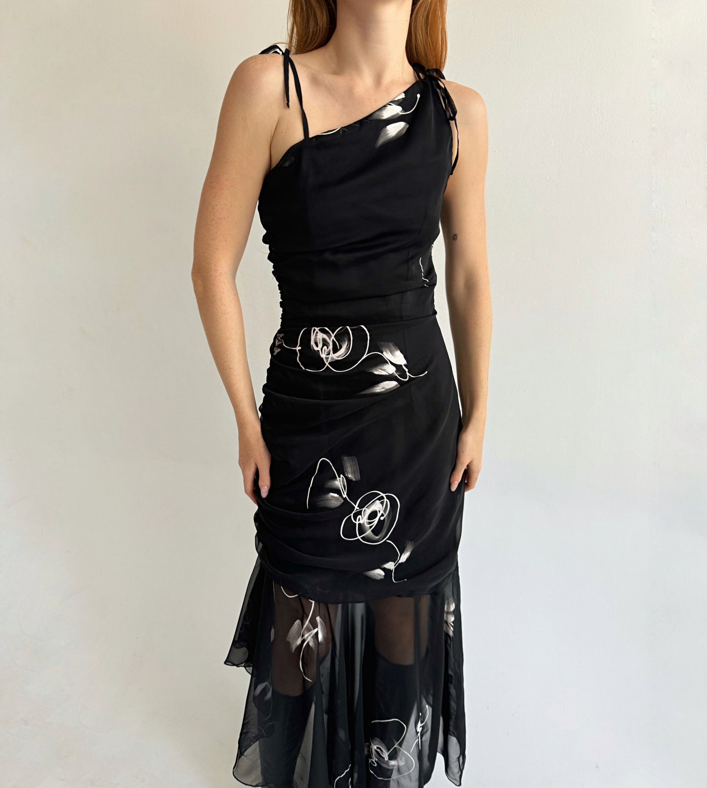 Vintage black asymmetrical maxi dress with a print, gathering and mesh bottom